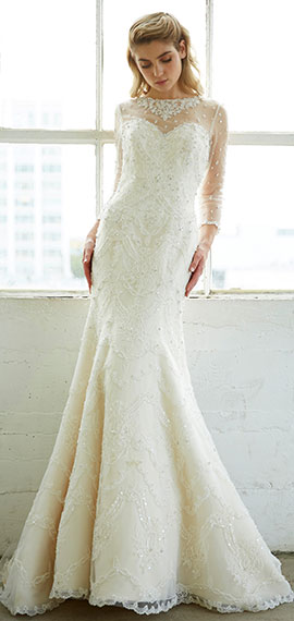 fit and flare bridal dress from fiore couture with sweetheart illusion neckline and three quarter length sleeves