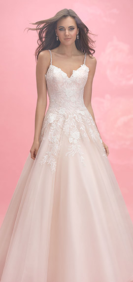 pink and ivory tulle ballgown bridal dress from allure with lace applique roses decorating the bodice